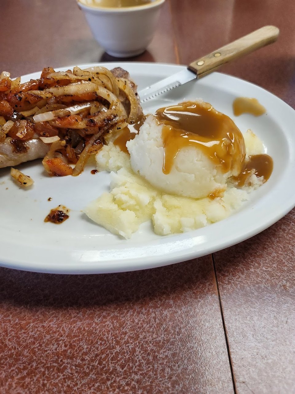 Close-up of diner menu items and categories.