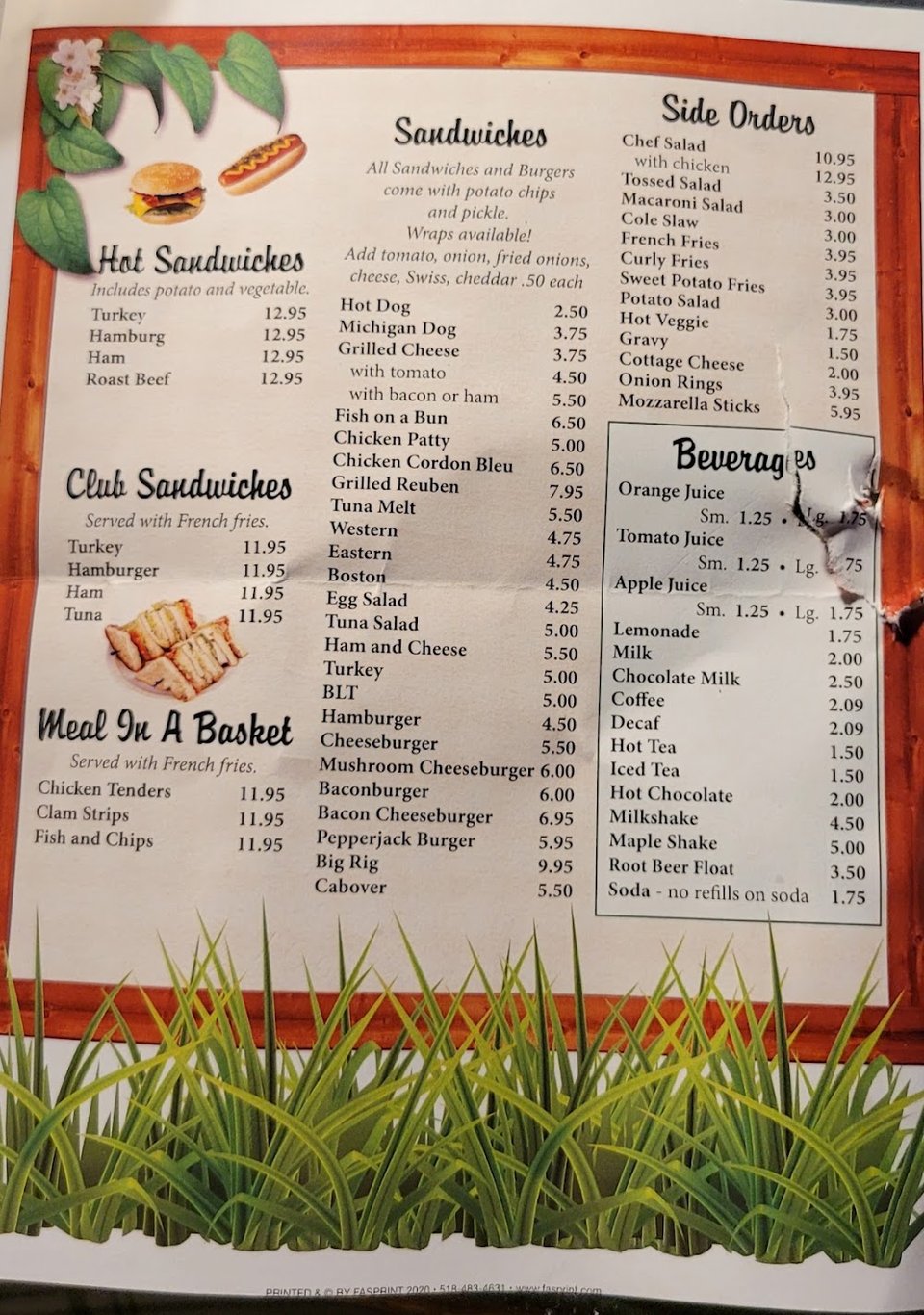 Close-up of diner menu items and categories.